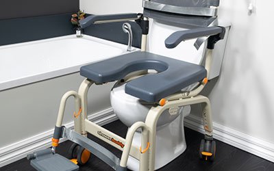A Showerbuddy toilet riser chair positioned over a toilet, designed to assist individuals with limited mobility.