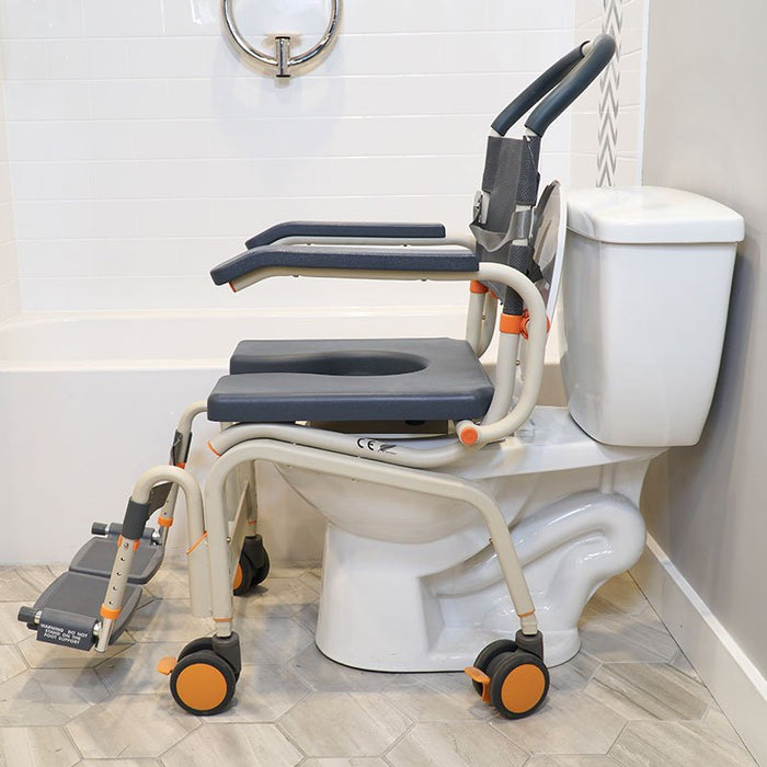 Showerbuddy toilet riser chair system attached to a standard toilet, emphasizing ease of use for individuals requiring elevated and secure seating throughout their bathroom routine.