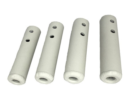 Four off-white cylindrical foam-covered poles with multiple holes, probably components for adjustable equipment or mobility aids.