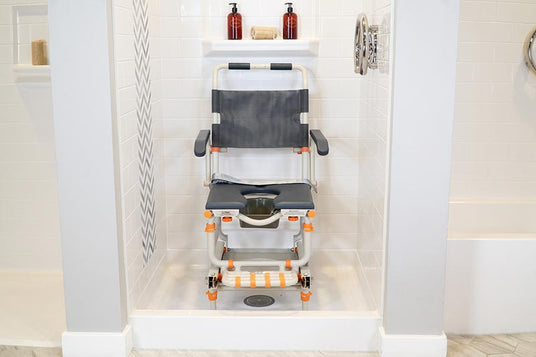 Showerbuddy transfer chair situated in a white-tiled shower area, inviting inquiries about the versatile Showerbuddy Transfer Range.