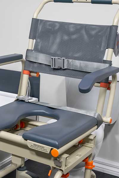 Vertical image of a Showerbuddy chair, focusing on the safety belt, which is part of the chair's safety features for secure bath transfers.