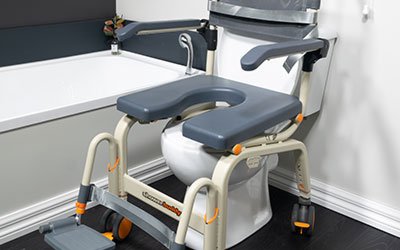 Image showing a Showerbuddy toilet riser chair positioned over a toilet, designed to assist individuals with limited mobility.