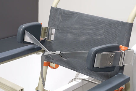 Detail of a mobility aid chair featuring a navy blue cushioned seat, grey mesh backrest, silver metal clasps, and safety harness with a beige frame and orange accents designed for secure and comfortable user support.